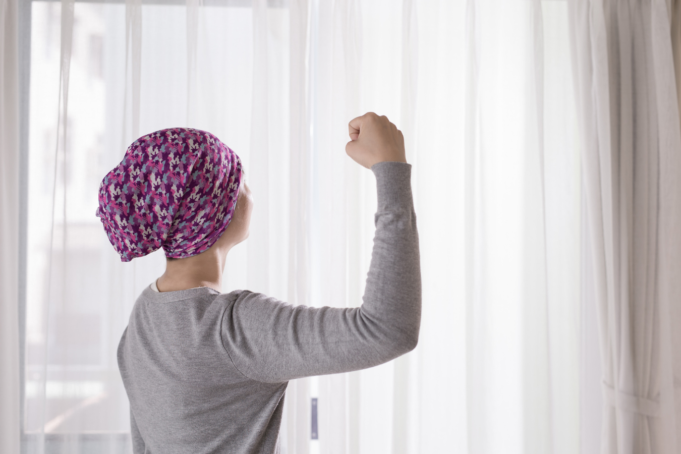 woman with cancer showing strength